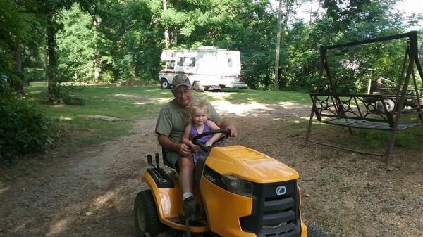 6-4-17 Victoria and Papaw on the lawnmower